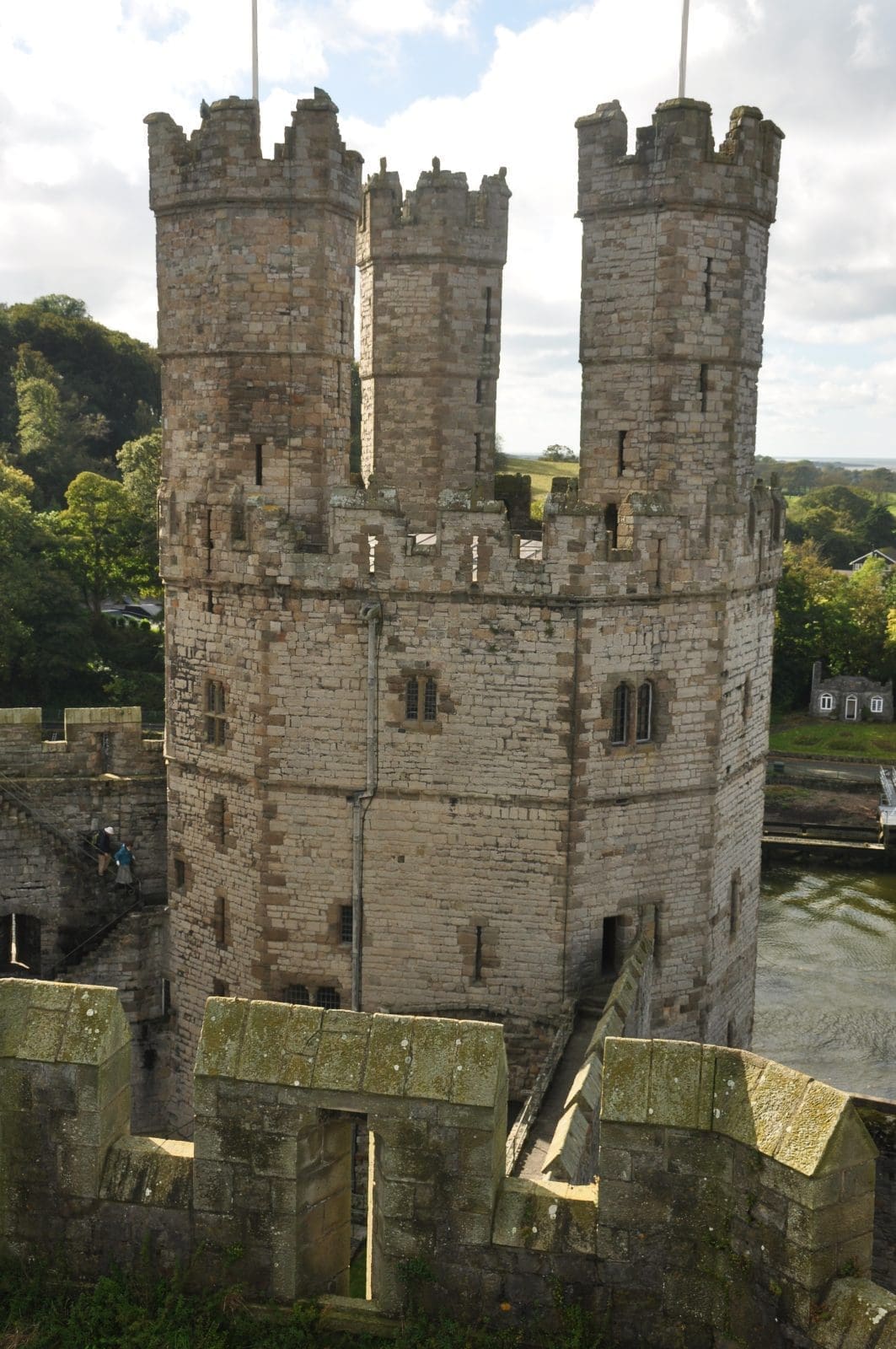 Arrow slits, murder holes, and well-situated tower positions provided overlapping fields of fire.