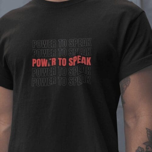 “Power to Speak,” its central line highlighted in striking bold red, ensuring you stand out in any crowd while advocating for a cause that resonates deeply with history buffs and activists