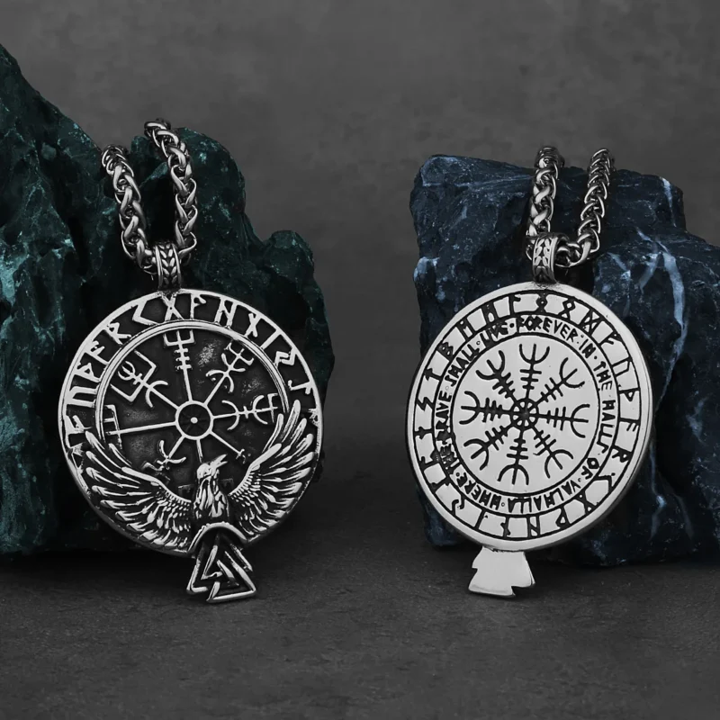 The Viking Rune Crow Pendant Chain Necklace features Viking runes, a central Vegvisir symbol, and an eagle with outstretched wings above a Valknut—a striking Norse design.