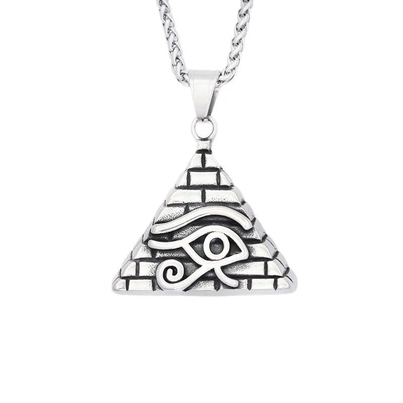 The Ancient Egyptian Eye of Horus is a silver necklace with a triangular, brick pyramid-style pendant featuring a raised black Eye of Horus symbol on the front.