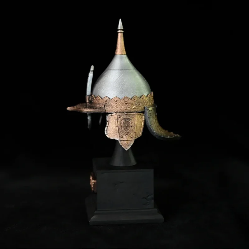 The Miniature Ancient Arabian Warrior Helmet features a pointed top and gold accents, displayed on a black pedestal with its full height marked as 135mm