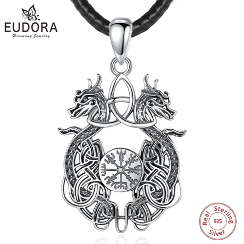 The Eudora 925 Sterling Silver Viking Dragon Necklace features two mirrored dragons, a central Celtic knot, and a Norse compass amulet on a black braided cord—an intricate and stylish gift for men or women.