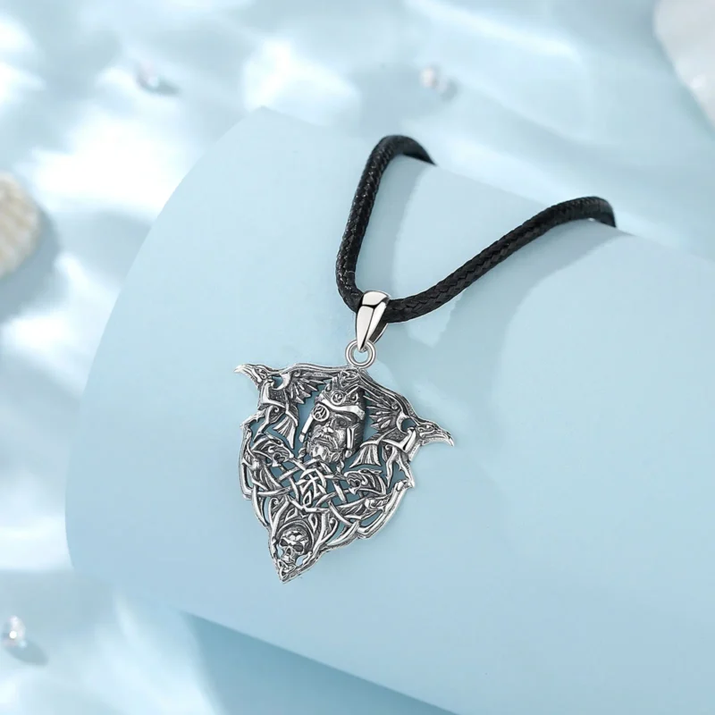 The Eudora 925 Sterling Silver Viking Raven Wolf Necklace for Men showcases a detailed Nordic Odin warrior skull pendant with Norse symbols and ravens, hanging on a black cord—an ideal personality jewelry gift.